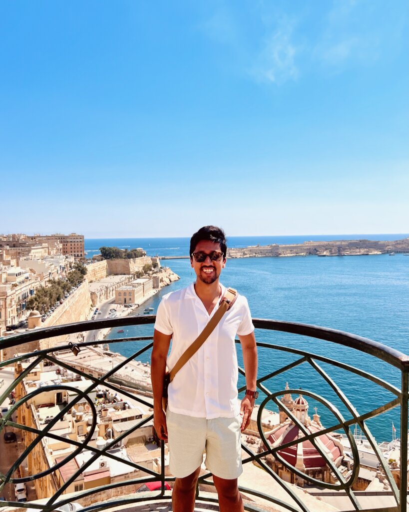 Sean with Malta Grand Harbour in background during Valletta walking tour